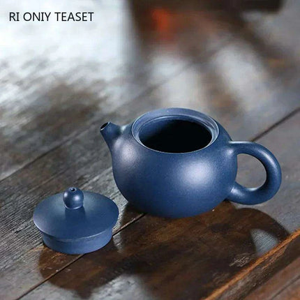Elegant Yixing Purple Clay Teapot – 100ml with Unique Ball Filter for Authentic Zisha Tea Experience
