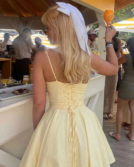 Sleek Black Cut-Out Mini Dress with Fashion-Forward Lace-Up Details