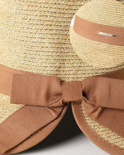 Chic Women's Korean Summer Wide Brim Straw Hat for Beach Trips, Vacation, and Sun Protection with Bow Fold Design