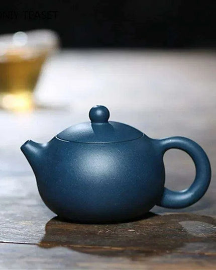 Elegant Yixing Purple Clay Teapot – 100ml with Unique Ball Filter for Authentic Zisha Tea Experience