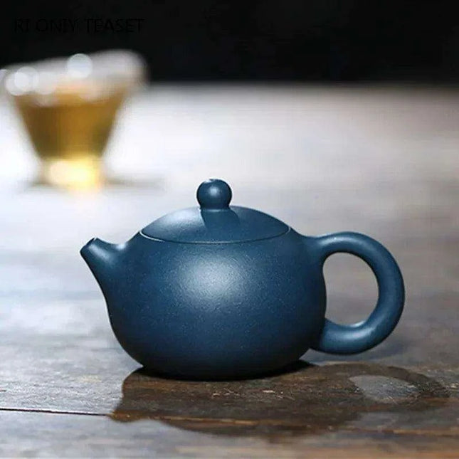 Elegant Yixing Purple Clay Teapot – 100ml with Unique Ball Filter for Authentic Zisha Tea Experience