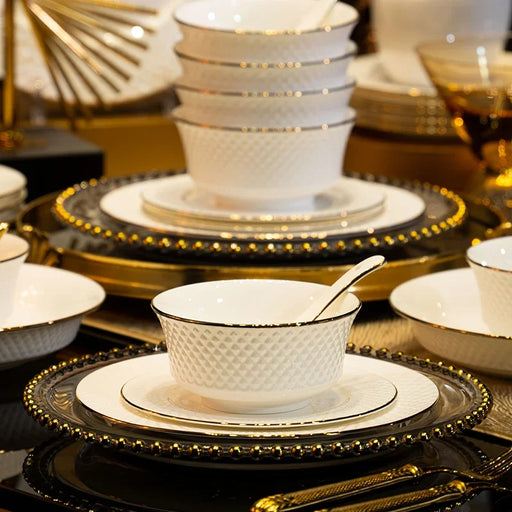 Elegant White Dinnerware and Cutlery Set for Discerning Food Enthusiasts