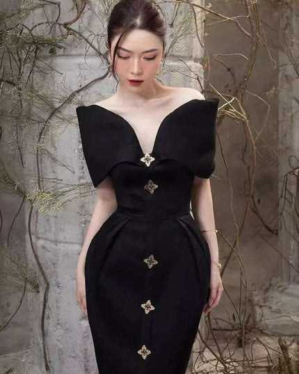 High-Waisted Evening Gown with Asymmetrical Neckline and Slit Detail