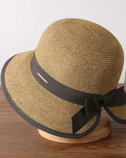 Chic Women's Korean Summer Wide Brim Straw Hat for Beach Trips, Vacation, and Sun Protection with Bow Fold Design