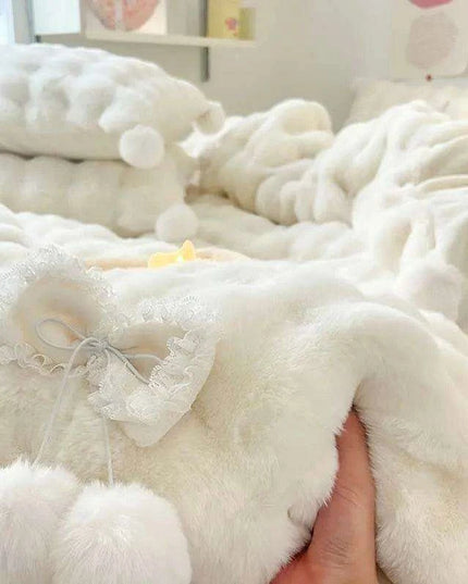 Plush Faux Rabbit Fur Bedding Ensemble with Charming Ball Accents - Duvet Cover, Sheets, and Pillowcases
