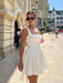 Elegant White Cotton Backless Dress with Oversized Bow - Effortless Sophistication for Any Occasion