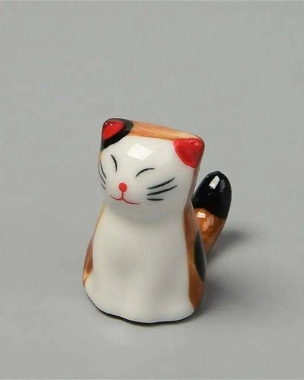 Playful Cat Cutlery and Chopstick Holder for a Whimsical Kitchen