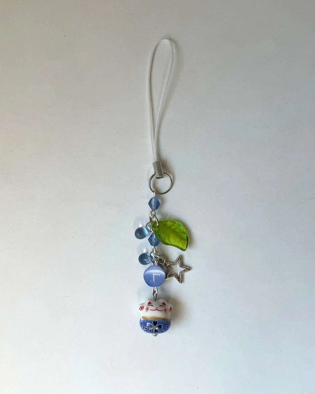 Charming Blue Cat Guardian Phone Accessory | Artisan Keychain with Leaf Detail