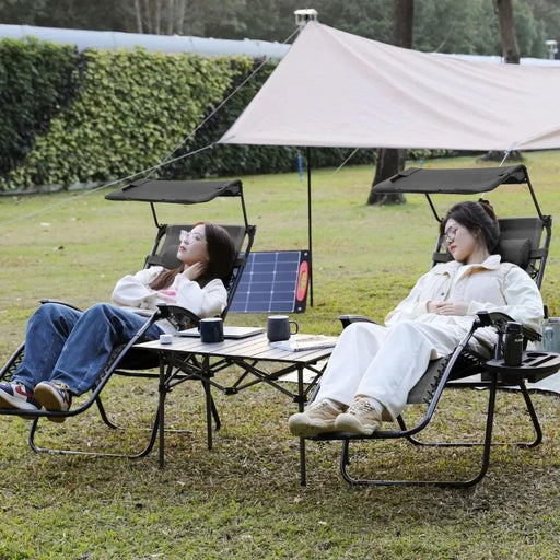 Sleek Black Mesh Reclining Lounge Chair with Adjustable Headrest and Convenient Side Tray - Perfect for Outdoor Relaxation