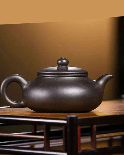 Handcrafted 140ml Yixing Purple Clay Teapot - Exquisite Zisha Kettle for Passionate Tea Aficionados