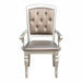 Glistening Silver Dining Ensemble with Crystal-Accented Tufted Chairs