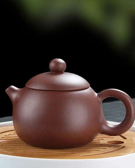 Elegant Yixing Purple Clay Teapot Set for Authentic Chinese Tea Brewing