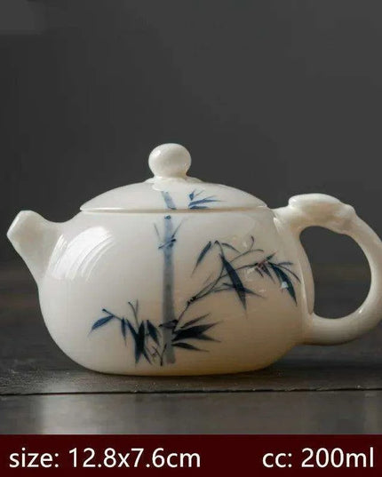 Artisan Xishi Tea Experience: Exquisite Hand-Painted Teapot Set with Premium Filter