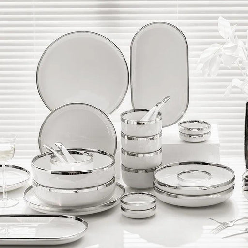 Sophisticated Elegance: White Ceramic Dinnerware Set with Silver Trim