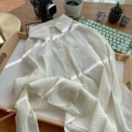 Loose-Fitting Women's Pleated Long-Sleeve Shirt with Pockets - Versatile Solid Color Sunscreen Top