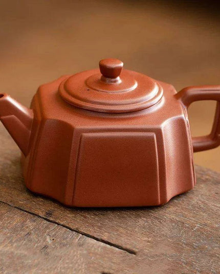 Authentic Artisan Yixing Purple Clay Teapot with Built-In Strainer for a Premium Puer Tea Experience