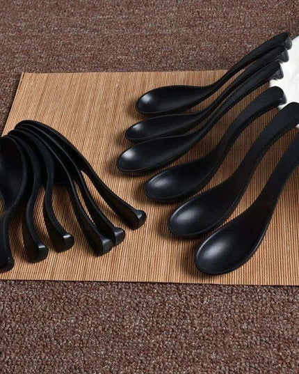 Sophisticated Black Melamine Serving Spoon with Elegant Japanese Porcelain Motif