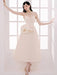 Elegant Apricot Velvet A-Line Slip Dress with Wave Hem Detail
