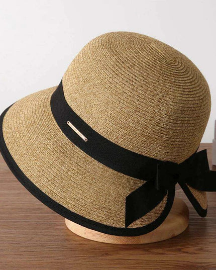 Chic Women's Korean Summer Wide Brim Straw Hat for Beach Trips, Vacation, and Sun Protection with Bow Fold Design