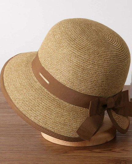 Chic Women's Korean Summer Wide Brim Straw Hat for Beach Trips, Vacation, and Sun Protection with Bow Fold Design