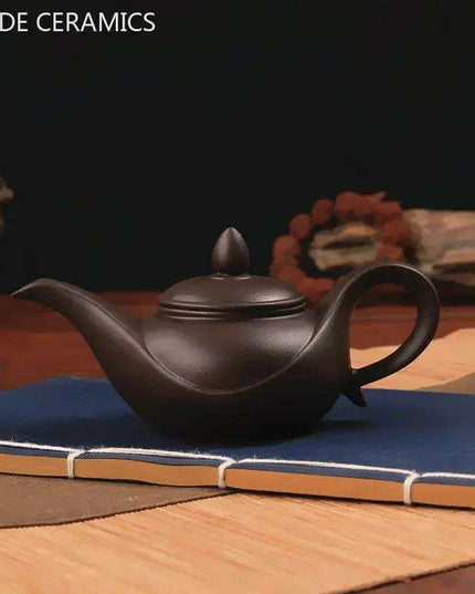 Artisan Yixing Zisha Teapot Set – Elegant Purple Clay Brew Kit for Home and Travel