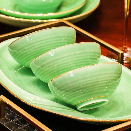 Sophisticated Blue and White Porcelain Dinnerware Set with Opulent Gold Accents