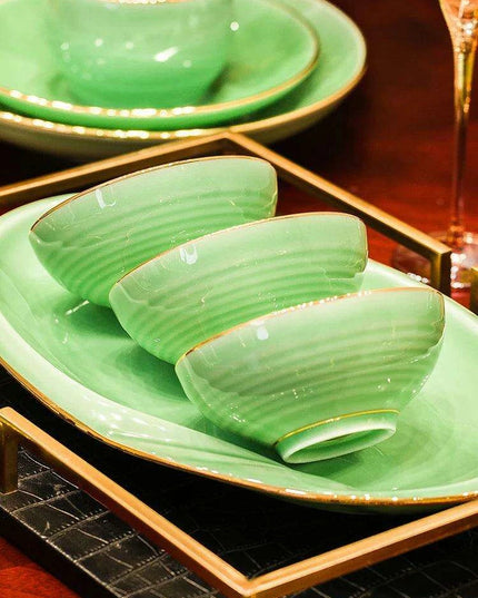 Sophisticated Blue and White Porcelain Dinnerware Set with Opulent Gold Accents