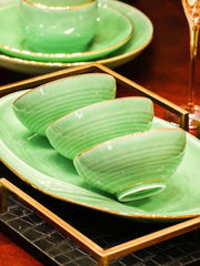 Sophisticated Blue and White Porcelain Dinnerware Set with Opulent Gold Accents