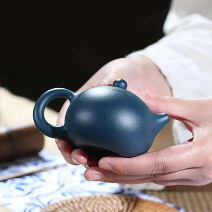 Elegant Yixing Purple Clay Teapot – 100ml with Unique Ball Filter for Authentic Zisha Tea Experience