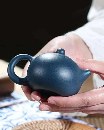 Elegant Yixing Purple Clay Teapot – 100ml with Unique Ball Filter for Authentic Zisha Tea Experience