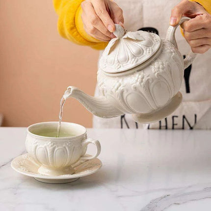 Sophisticated Tea Set: Handcrafted Ceramic Teapot and Mugs Ensemble