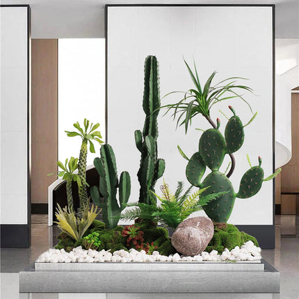The Space Under The Staircase Is Decorated with Simulated Green Plants in The Desert Creating Indoor Micro-landscape the-space-under-the-staircase-is-decorated-with-simulated-green-plants-in-the-desert-creating-indoor-micro-landscape