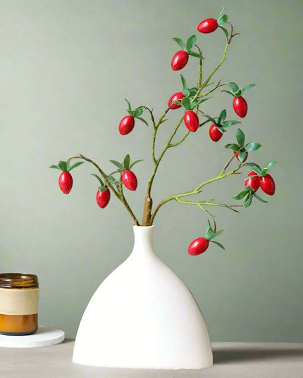 Festive Red Pomegranate Floral Branch with Lush Greenery