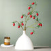 Festive Red Pomegranate Floral Branch with Lush Greenery