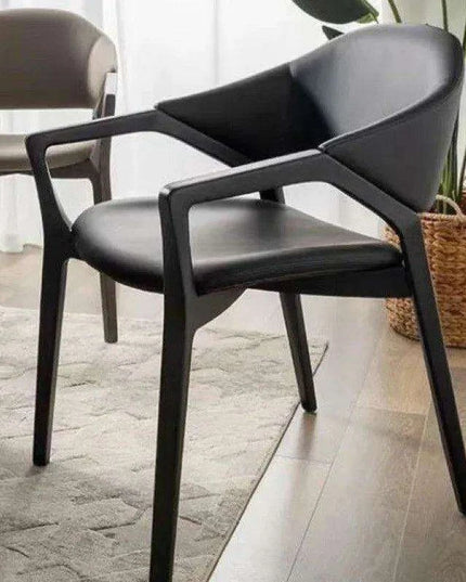 Scandinavian Luxe Leather Dining Chair with Contemporary Armrests