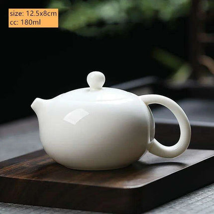 Elegant Dehua White Porcelain Teapot with Built-in Filter - Travel-Friendly Chinese Tea Set for Home and Adventure