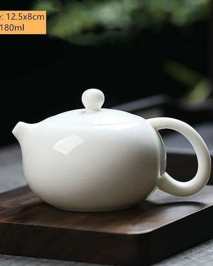 Elegant Dehua White Porcelain Teapot with Built-in Filter - Travel-Friendly Chinese Tea Set for Home and Adventure