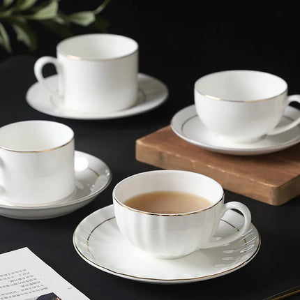 Gold-Rimmed Bone China Coffee Cup & Saucer Set | Très Elite