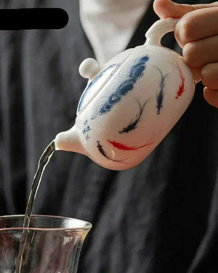 Artisan Xishi Tea Experience: Exquisite Hand-Painted Teapot Set with Premium Filter