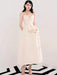 Elegant Apricot Velvet A-Line Slip Dress with Wave Hem Detail