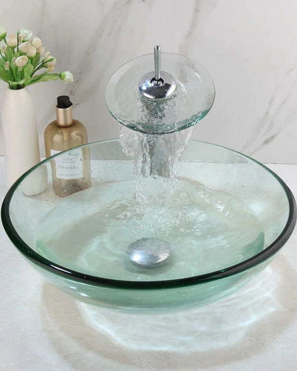 Elegant Blue Glass Vessel Sink Ensemble with Waterfall Faucet