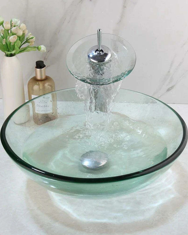 Elegant Blue Glass Vessel Sink Ensemble with Waterfall Faucet