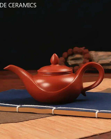 Artisan Yixing Zisha Teapot Set – Elegant Purple Clay Brew Kit for Home and Travel