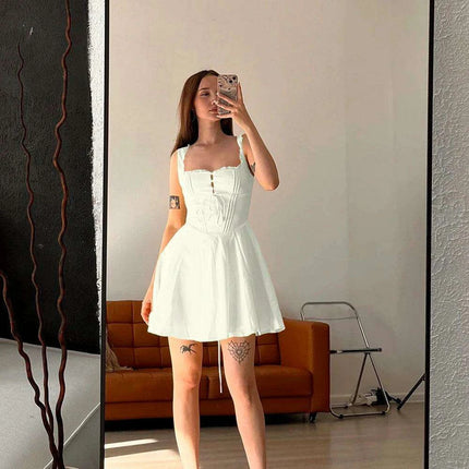 Sleek Black Cut-Out Mini Dress with Fashion-Forward Lace-Up Details - Très Elite