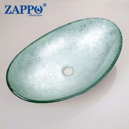 Sleek Chrome Faucet and Oval Glass Sink Ensemble with Pop-Up Drain Assembly..