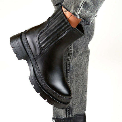 Sleek Eco-Friendly Black Leather Ankle Boots for Effortless Style - Très Elite