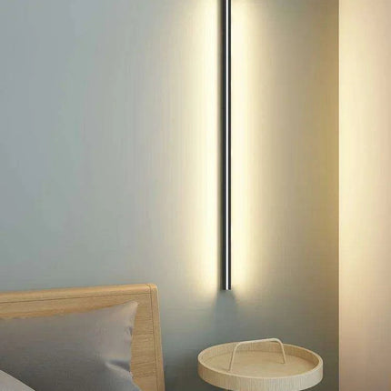 Sleek Scandinavian LED Wall Sconce with Customizable Lighting Options..