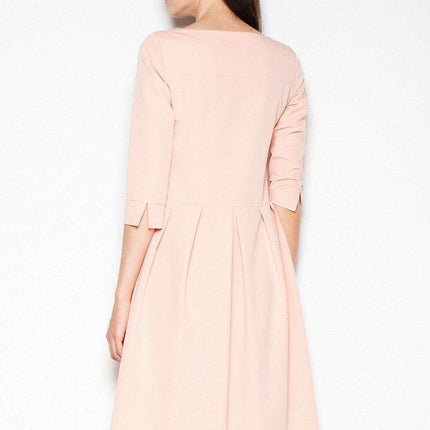 Sophisticated Asymmetrical Pleated Dress with Striking Back Feature - Très Elite