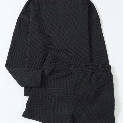 Sophisticated Black Textured Lounge Set with Long Sleeve Top and Adjustable Shorts - Très Elite