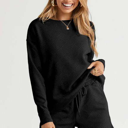 Sophisticated Black Textured Lounge Set with Long Sleeve Top and Adjustable Shorts - Très Elite